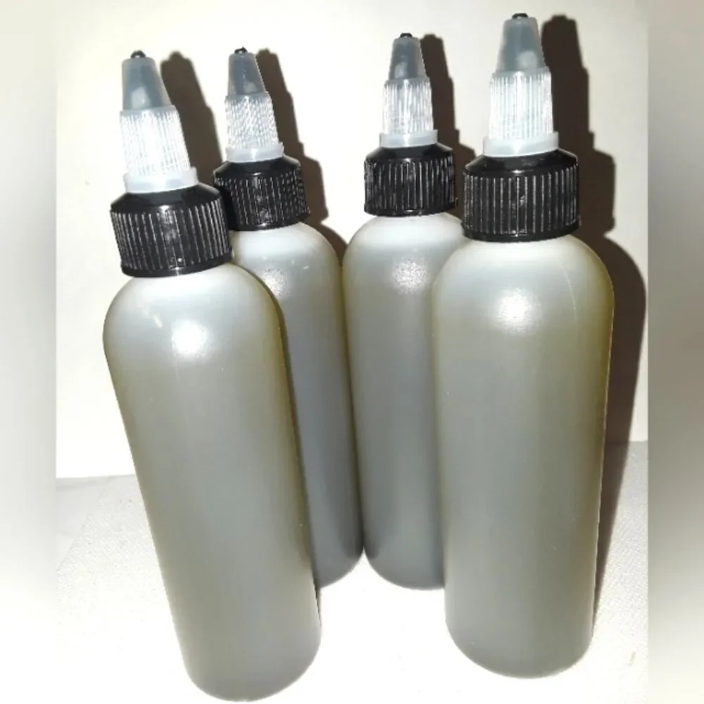 HAND crafted Neem and Amla hair and body oil